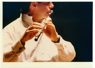 Geoffrey Collins playing flute, year unknown