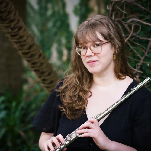 Emma Claire holding a flute 