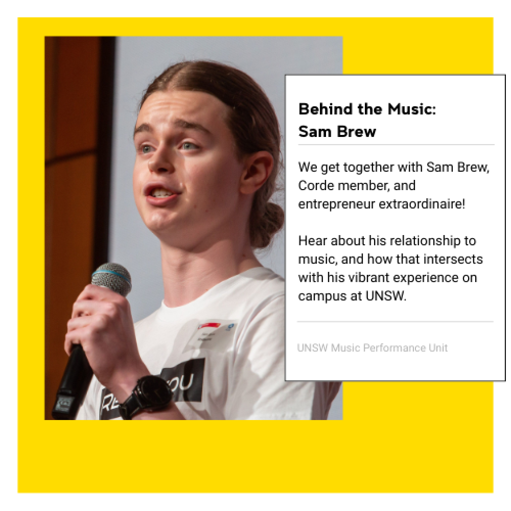 Sam Brew holding a microphone